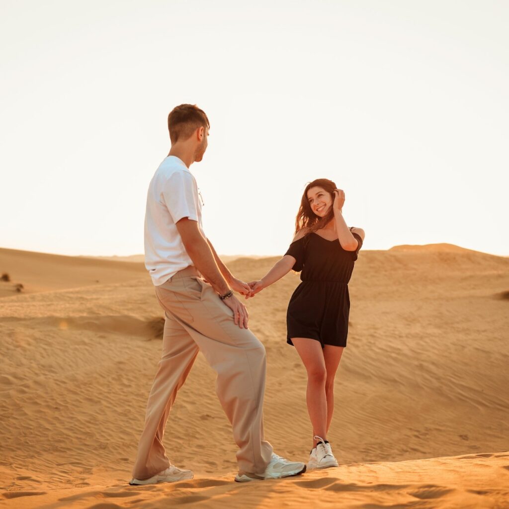 abu dhabi desert safari couple