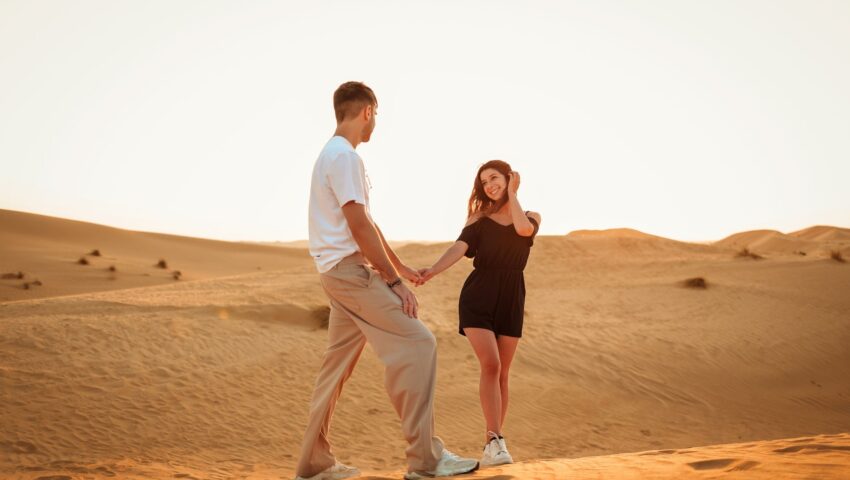 abu dhabi desert safari couple